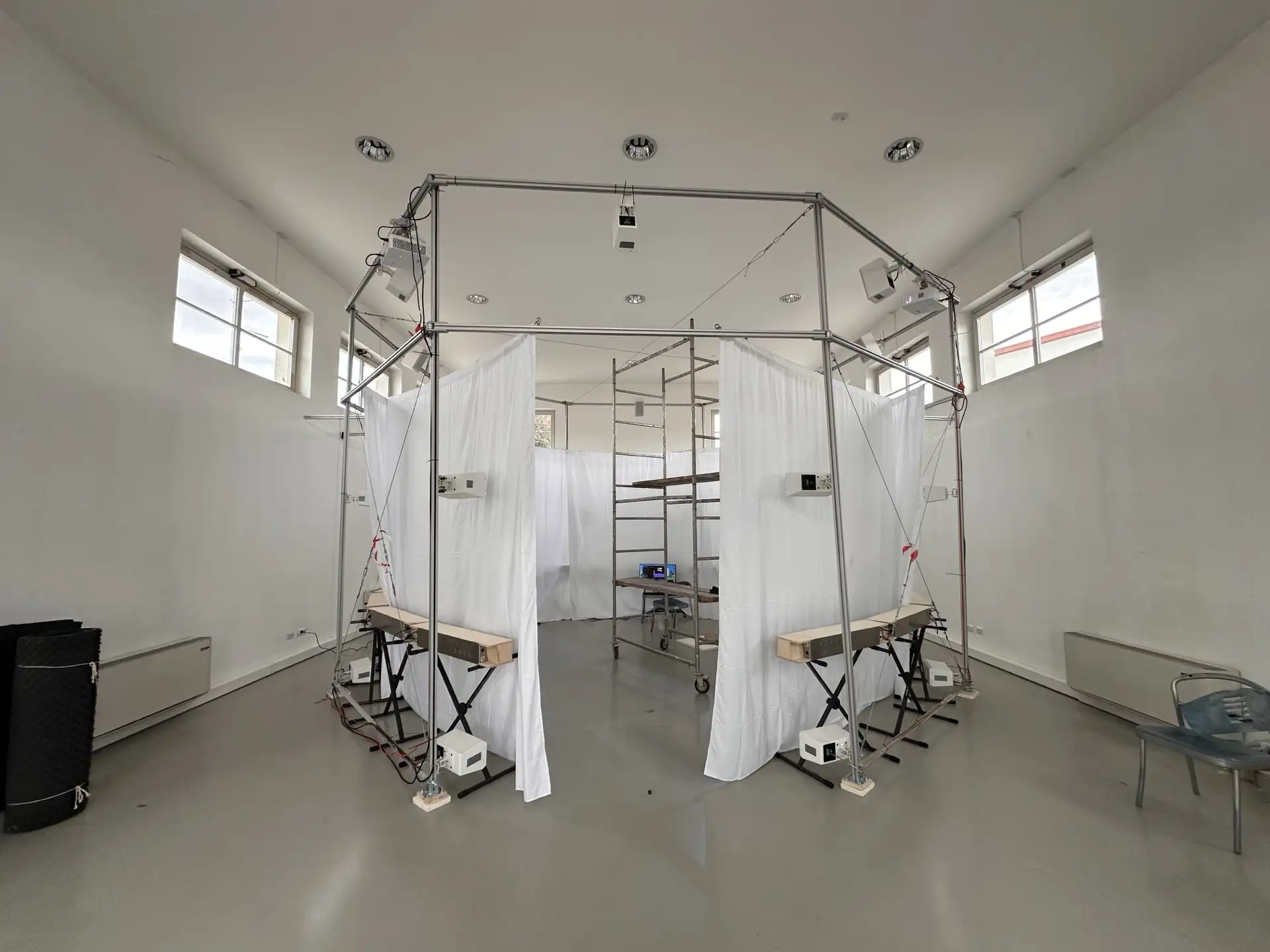 Photography screens hanging from steel cables